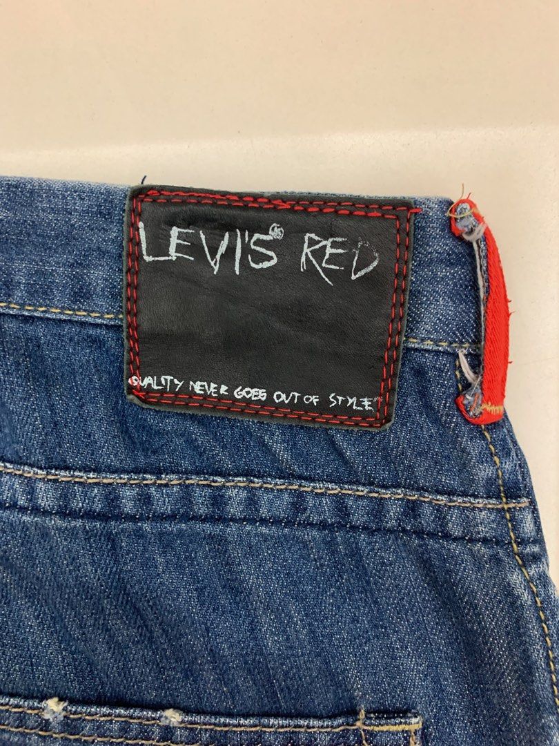 Levi’s RED Archive Denim (W30) (Category: Jeans) located in Mabalacat. Submitted by thriftkolangmagbenta (Listing ID 1471107159, Image 3). Description: Rare Levi’s RED line piece. Black leather back patch, star button, red keyhole stitching, and accent belt loops. Rare archive pair. Measurements: • Waist: 30 in • Length: 40 in • Thigh: 12 in • Hem: 9.5 in .