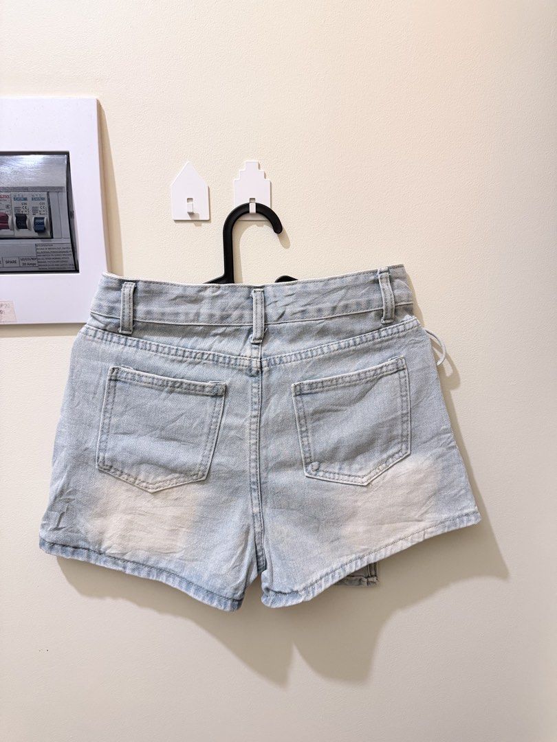 Light Vintage Overlap Denim Skort (Category: Skirts) located in Manila. Submitted by xmagic.shopx (Listing ID 1470959987, Image 2). Description: Waistline: 26-27 inches Hips: 32-34 inches Length: 14 inches.