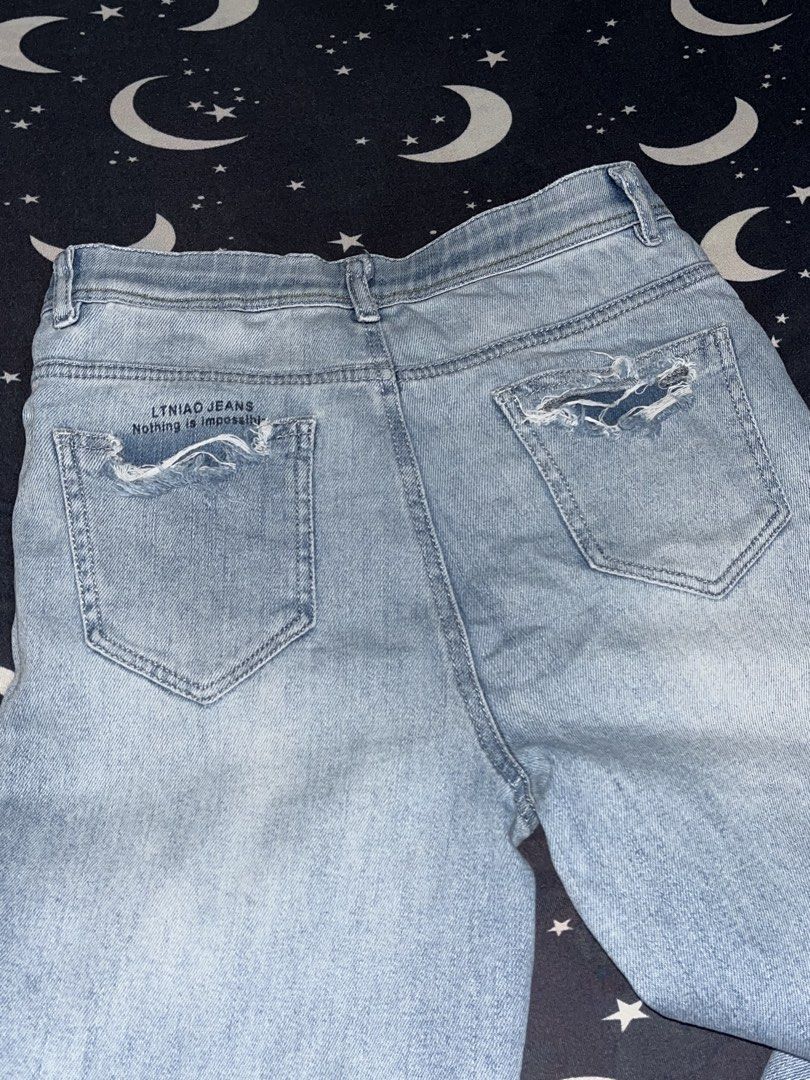 Light Wash Denim Pants (Category: Jeans) located in Alicia. Submitted by lovedby.icy (Listing ID 1471060130, Image 2). Description: | distressed details on both back pockets | flaws: a small distressed spot and white spots on the front (shown in 3rd and 4th pics).