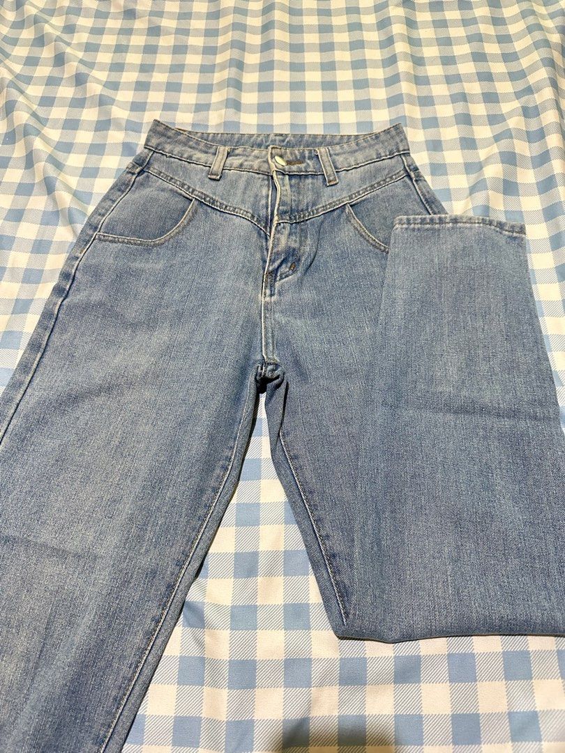 Light wash high-waisted denim jeans (Category: Jeans) located in Mandaluyong City. Submitted by brightbird-5701 (Listing ID 1471062989, Image 1). Description: Light wash denim jeans with a high waist design. Curved front pockets and front button closure. Straight leg cut, easy to style with everyday tops. Measured waist flat is roughly twelve inches across..