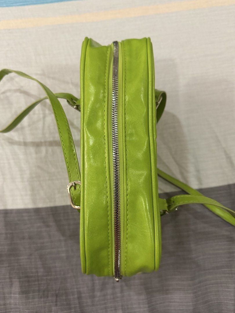 Lime Green Bag (Category: Shoulder Bags) located in Manila. Submitted by mxz18821 (Listing ID 1470982876, Image 2). Description: -Bought for 591 -Straps peeling shown in photo -Zippers all working well -Price is negotiable Buyer will shoulder sf.