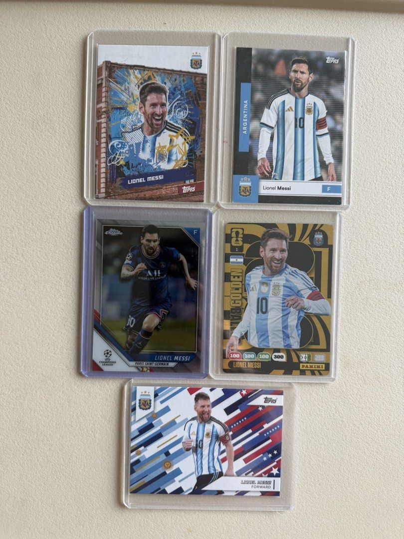 Lionel Messi (Category: Raw Singles) located in Paranaque City. Submitted by safehands1 (Listing ID 1470970146, Image 2). Description: Messi topps black - 1k Messi topps new york - 1k Messi golden baller - 1.5k Messi topps landscape - 1k Messi topps chrome psg - 1k Lot 5k only All with top loader and all mint condition.