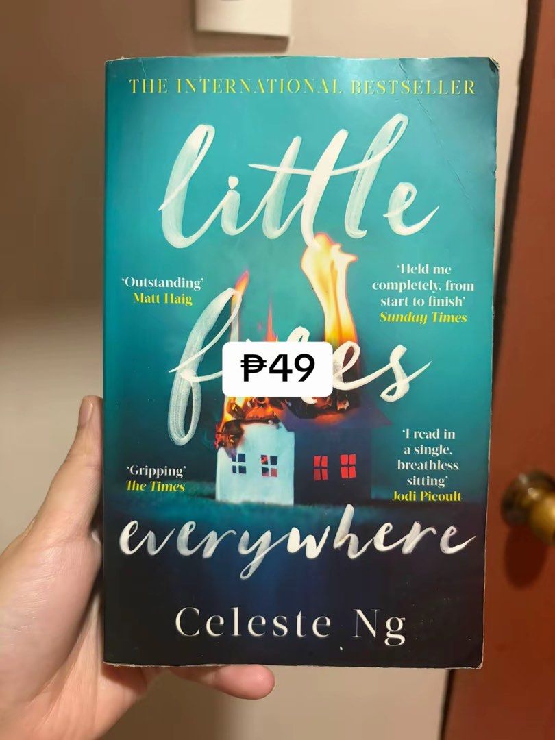 Little Fires Everywhere by Celeste Ng paperback novel (Category: Storybooks) located in Malabon City. Submitted by maryannejolo (Listing ID 1470983748, Image 1). Description: - Title: Little Fires Everywhere by Celeste Ng (Paperback Edition) - Genre: Bestselling contemporary fiction novel with cover praise quotes - Condition: Clean pages, highly readable, with minor shelf wear along edges - Ideal for: A captivating weekend read or a great additio