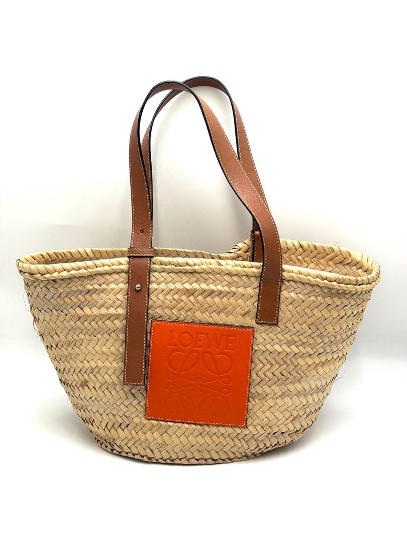 Loewe Raffia Large tote with Orange Logo (Category: Luxury Bags & Wallets) located in Taguig. Submitted by gcarlet1996 (Listing ID 1470972915, Image 1). Description: .