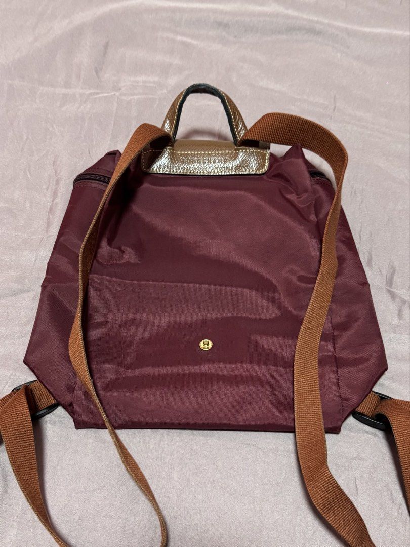 Longchamp Le Pliage Backpack (Category: Luxury Bags & Wallets) located in Quezon City. Submitted by meecaisawesome (Listing ID 1471006242, Image 2). Description: Negotiable for sure buyers! - Dirty bag flap but washable.