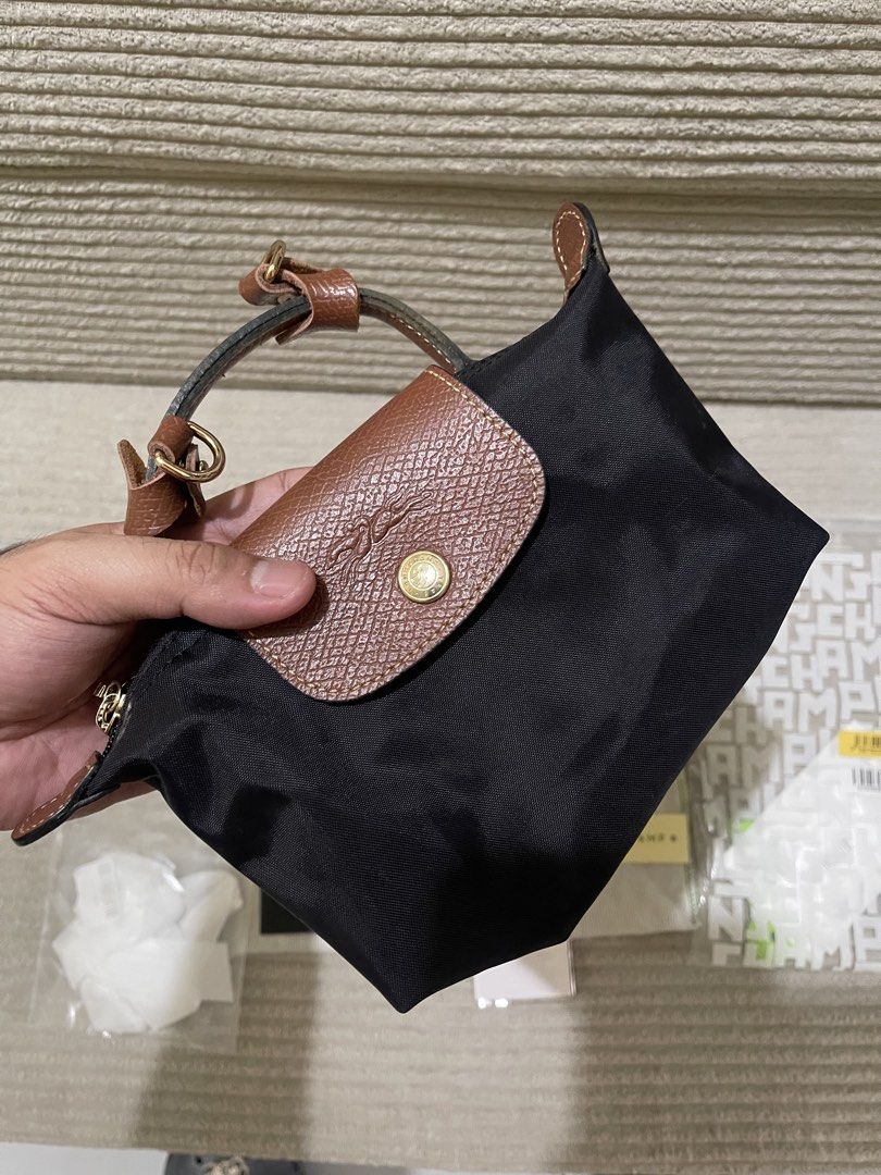 LONGCHAMP LE PLIAGE CLASSIC MINI (Category: Luxury Bags & Wallets) located in Pasay City. Submitted by markmyluxuryph (Listing ID 1471027161, Image 2). Description: LONGCHAMP LE PLIAGE CLASSIC MINI Pre-Loved 100% Authentic Almost Complete Set (No Paper Bag) Comes with a FREE Sling Price: ₱5,500 + Shipping Fee (SF) 📌 PLEASE READ BEFORE BUYING: No returns or exchanges allowed. Mine only if you are 100% sure about your purchase. Thank you for suppo
