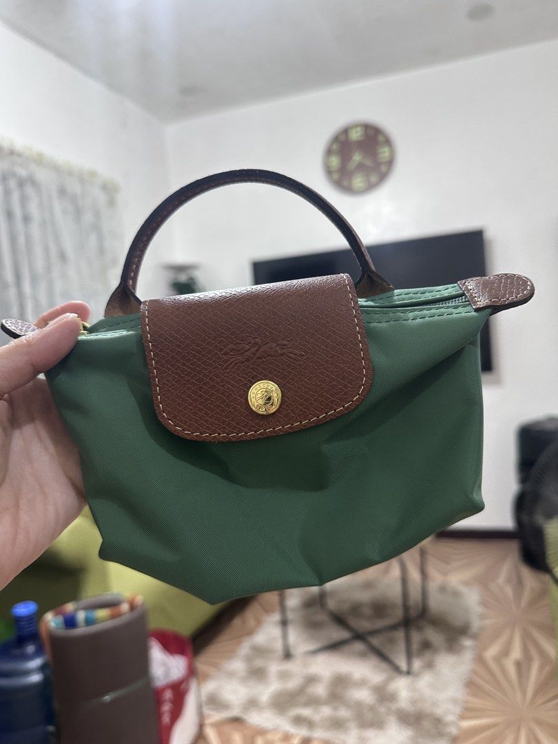 Longchamp Le Pliage Original Pouch with Handle (Category: Purses & Pouches) located in Malabon City. Submitted by seseche (Listing ID 1471047190, Image 2). Description: Longchamp Le Pliage Original Pouch with Handle.
