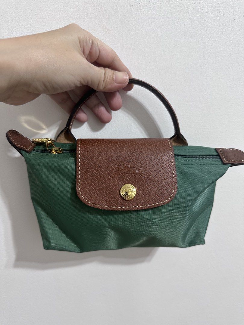 Longchamp Le Pliage Original Pouch with Handle (Category: Purses & Pouches) located in Malabon City. Submitted by seseche (Listing ID 1471047190, Image 1). Description: Longchamp Le Pliage Original Pouch with Handle.