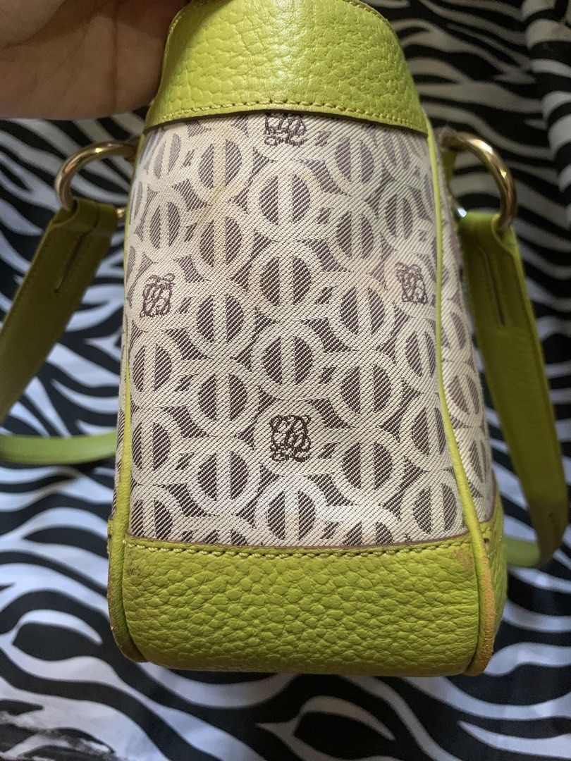 Louis Quatorze Y2k Shoulder Bag (Category: Luxury Bags & Wallets) located in Manila. Submitted by usagichan_rabbit (Listing ID 1471010064, Image 3). Description: Loewe shoulder bag in a lime green and beige colorway. Features the iconic Anagram monogram pattern across the canvas body. Center stripe in metallic gold snakeskin texture flanked by darker green leather. Dual leather shoulder straps and matching green leather trim with perforated corne