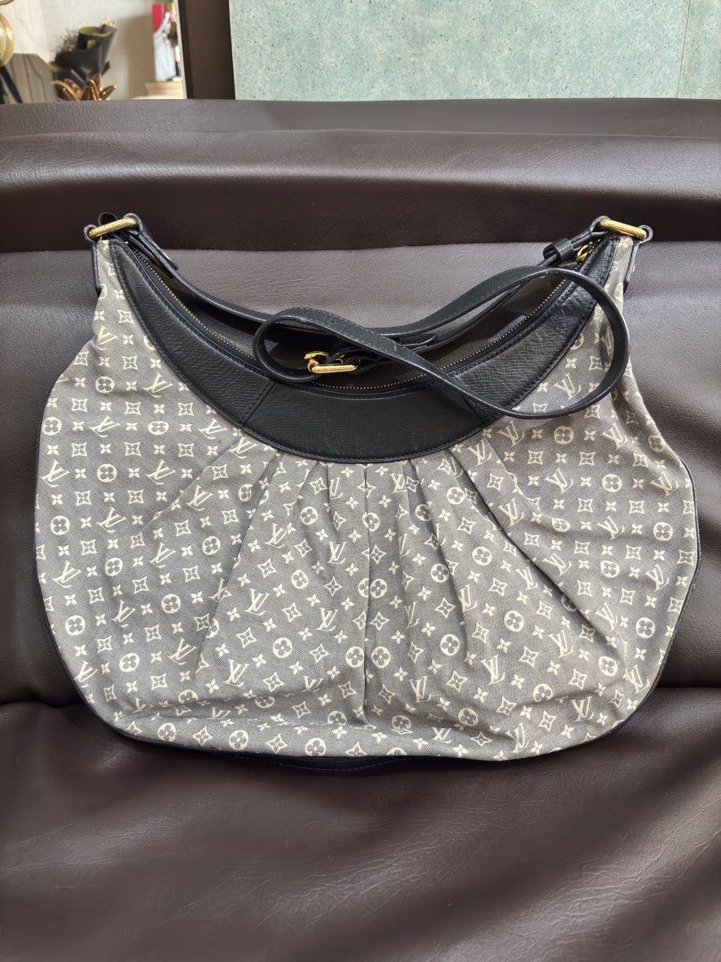 Louis Vuitton Idylle Rhapsody Shoulder Bag (Category: Luxury Bags & Wallets) located in Manila. Submitted by katrine_gervacio (Listing ID 1471077594, Image 2). Description: - Material: Monogram Mini Lin canvas in blue-grey - Design: Pleated bottom with dark leather trim and strap - Hardware: Gold-tone with engraved branding - Closure: Zipper closure with fabric-lined interior and slip pockets - Origin: Made in Italy.
