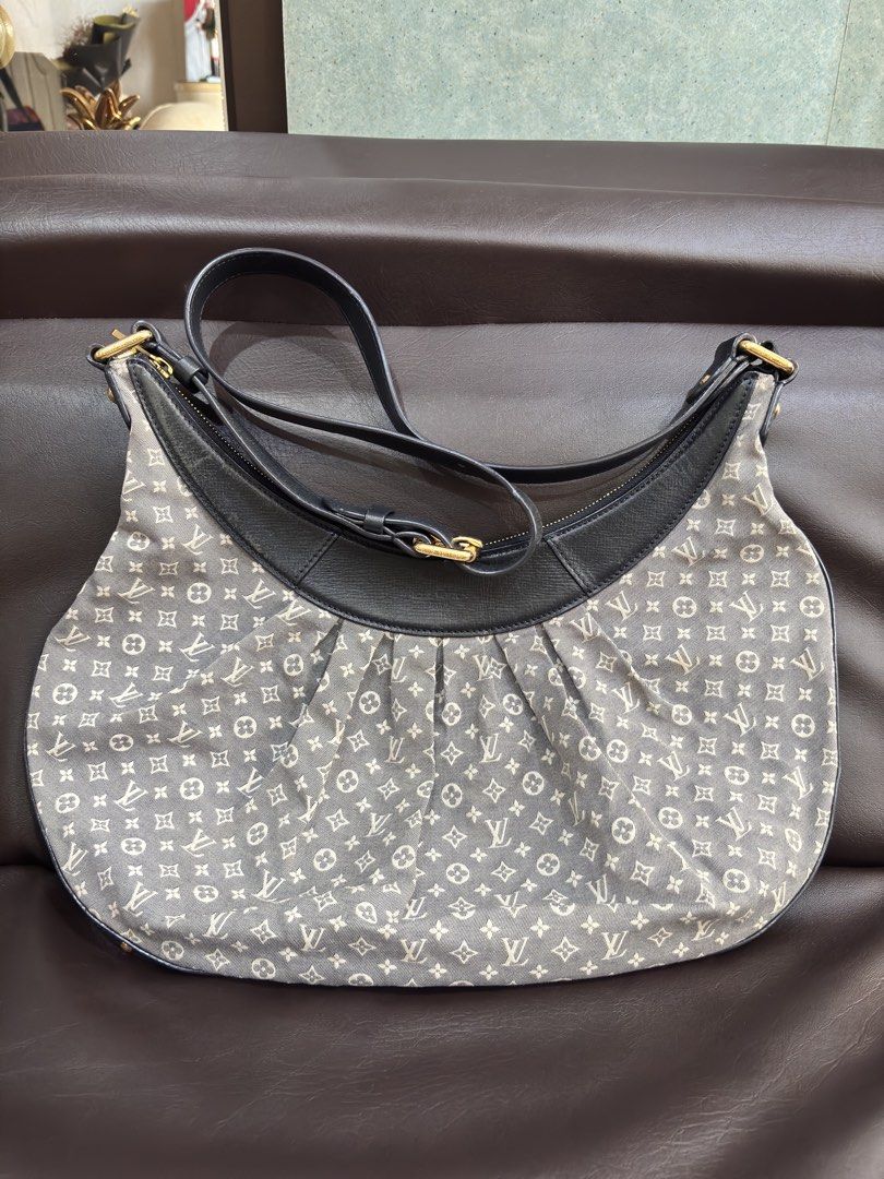 Louis Vuitton Idylle Rhapsody Shoulder Bag (Category: Luxury Bags & Wallets) located in Manila. Submitted by katrine_gervacio (Listing ID 1471077594, Image 1). Description: - Material: Monogram Mini Lin canvas in blue-grey - Design: Pleated bottom with dark leather trim and strap - Hardware: Gold-tone with engraved branding - Closure: Zipper closure with fabric-lined interior and slip pockets - Origin: Made in Italy.