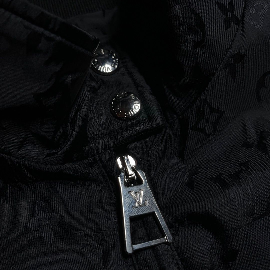 Louis Vuitton Monogram Black Bomber Jacket (Category: Coats, Jackets and Outerwear) located in Caloocan City. Submitted by achilles_grails (Listing ID 1471050350, Image 3). Description: - Authentic black Louis Vuitton zip-up jacket - All-over subtle tonal LV monogram pattern - Stand collar with branded snap buttons - Full front zipper with signature LV pull tab - Comfortable ribbed cuffs and hem - Clean hardware and crisp fabric weave - Interior 