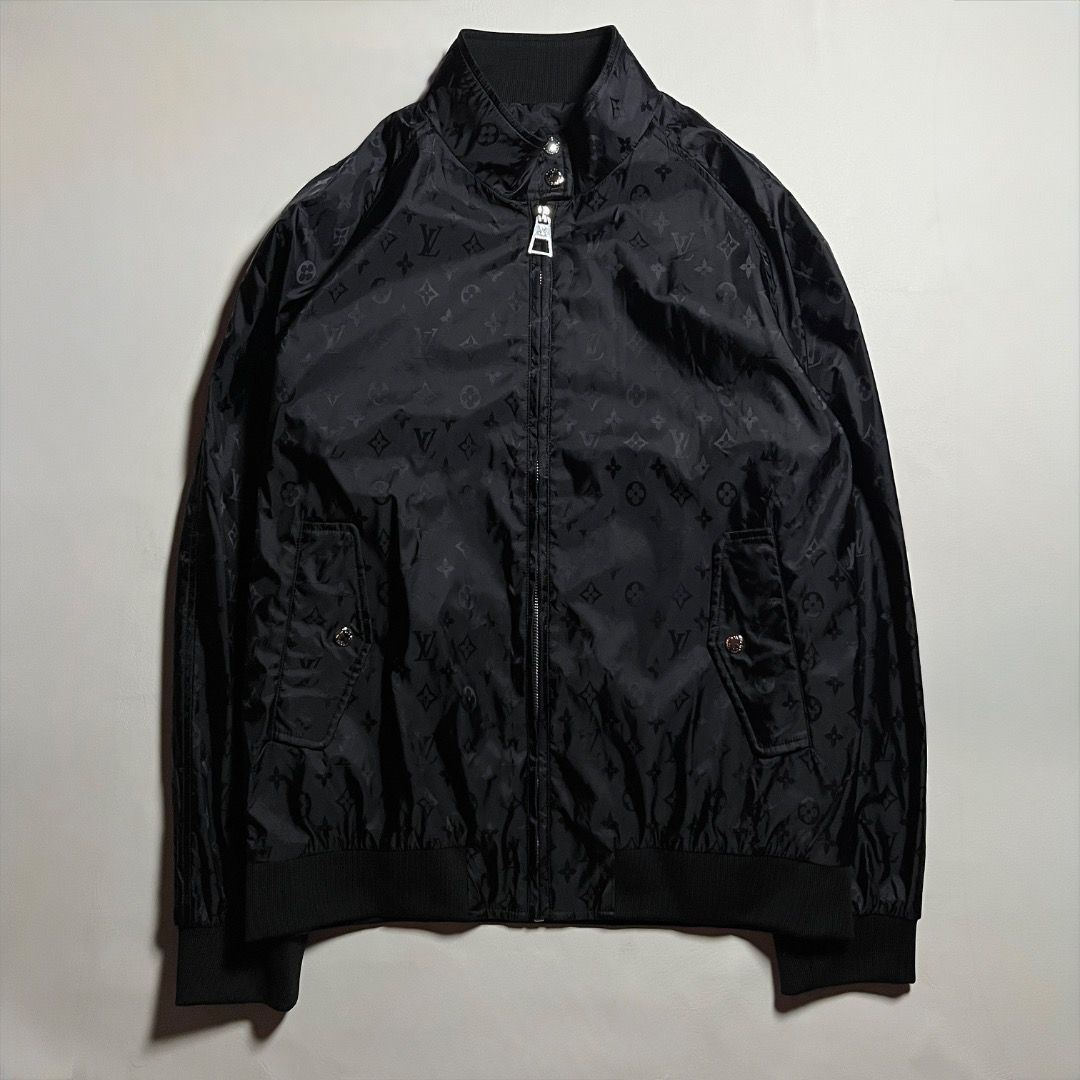 Louis Vuitton Monogram Black Bomber Jacket (Category: Coats, Jackets and Outerwear) located in Caloocan City. Submitted by achilles_grails (Listing ID 1471050350, Image 1). Description: - Authentic black Louis Vuitton zip-up jacket - All-over subtle tonal LV monogram pattern - Stand collar with branded snap buttons - Full front zipper with signature LV pull tab - Comfortable ribbed cuffs and hem - Clean hardware and crisp fabric weave - Interior 