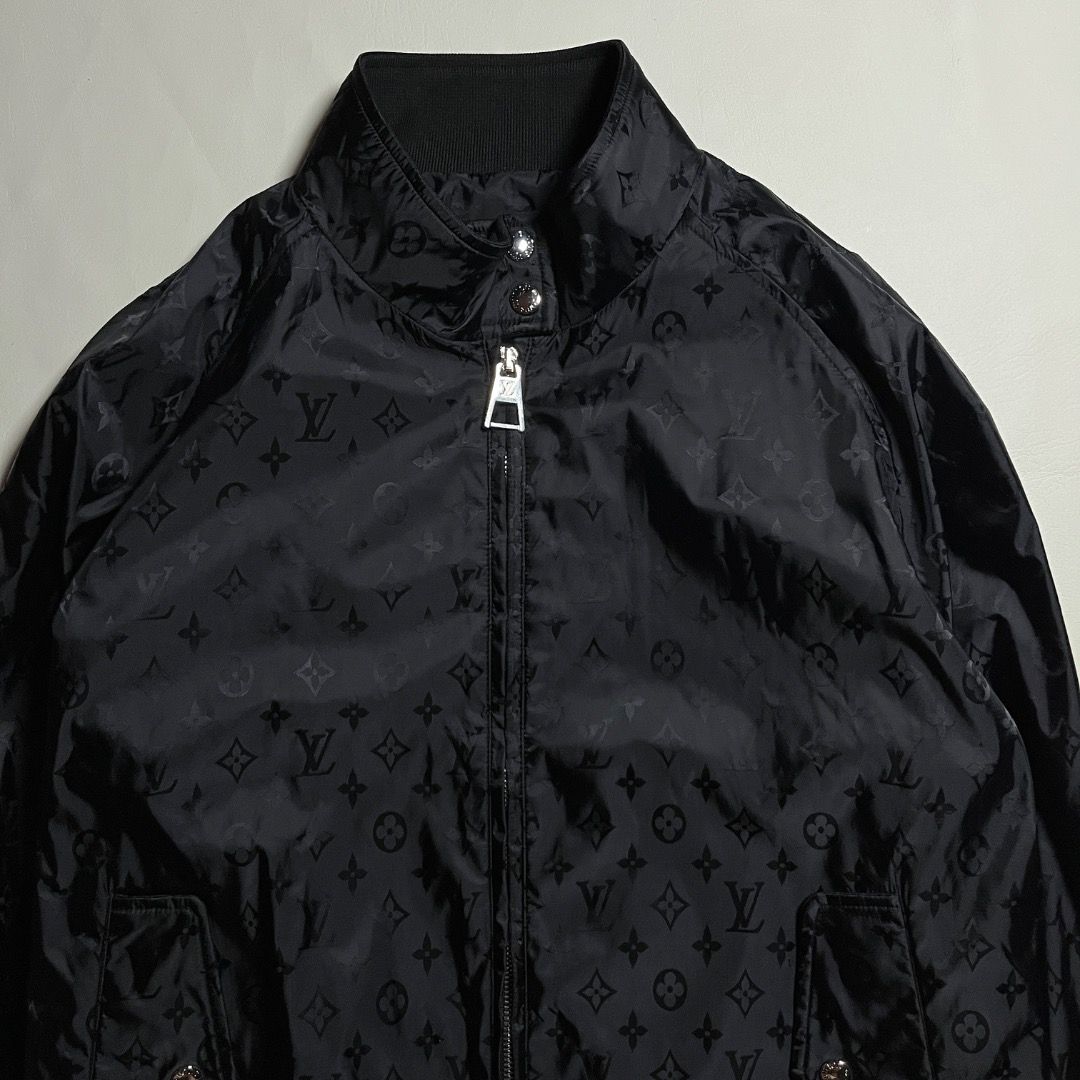 Louis Vuitton Monogram Black Bomber Jacket (Category: Coats, Jackets and Outerwear) located in Caloocan City. Submitted by achilles_grails (Listing ID 1471050350, Image 2). Description: - Authentic black Louis Vuitton zip-up jacket - All-over subtle tonal LV monogram pattern - Stand collar with branded snap buttons - Full front zipper with signature LV pull tab - Comfortable ribbed cuffs and hem - Clean hardware and crisp fabric weave - Interior 