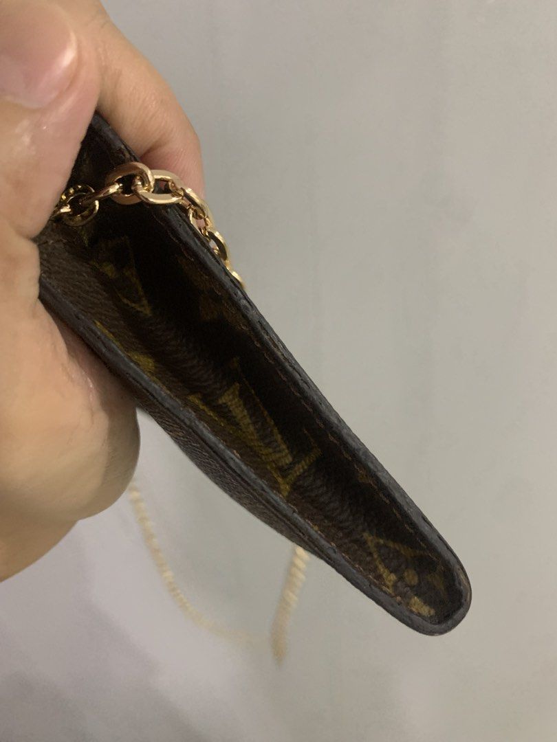 Louis Vuitton Monogram Canvas Toiletry Pouch With Chain (Category: Luxury Bags & Wallets) located in Butuan. Submitted by stuffsavenue (Listing ID 1470960577, Image 2). Description: - Authentic Louis Vuitton Monogram canvas pouch - Includes a stylish gold-tone chain strap ( i bought separately) - Classic brown LV monogram pattern throughout - Secure top zip closure with leather pull tab (heat-stamped Louis Vuitton Paris Made in France) - changes 