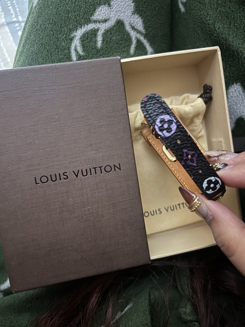 Louis Vuitton Monogram Multicolor (Category: Luxury Accessories) located in Cavite. Submitted by zacharyyy__ (Listing ID 1471059451, Image 3). Description: - Authentic Louis Vuitton Address Wish Bracelet - Classic black canvas with vibrant multicolor monogram pattern - Charming tan leather bow detail and gold-tone hardware - Adjustable buckle fastening for a secure fit - Includes original Louis Vuitton brown box and dust bag - Stunning statement 