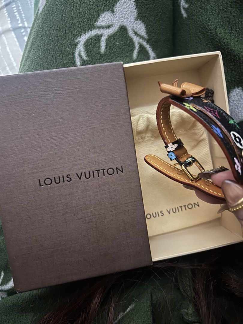 Louis Vuitton Monogram Multicolor (Category: Luxury Accessories) located in Cavite. Submitted by zacharyyy__ (Listing ID 1471059451, Image 2). Description: - Authentic Louis Vuitton Address Wish Bracelet - Classic black canvas with vibrant multicolor monogram pattern - Charming tan leather bow detail and gold-tone hardware - Adjustable buckle fastening for a secure fit - Includes original Louis Vuitton brown box and dust bag - Stunning statement 