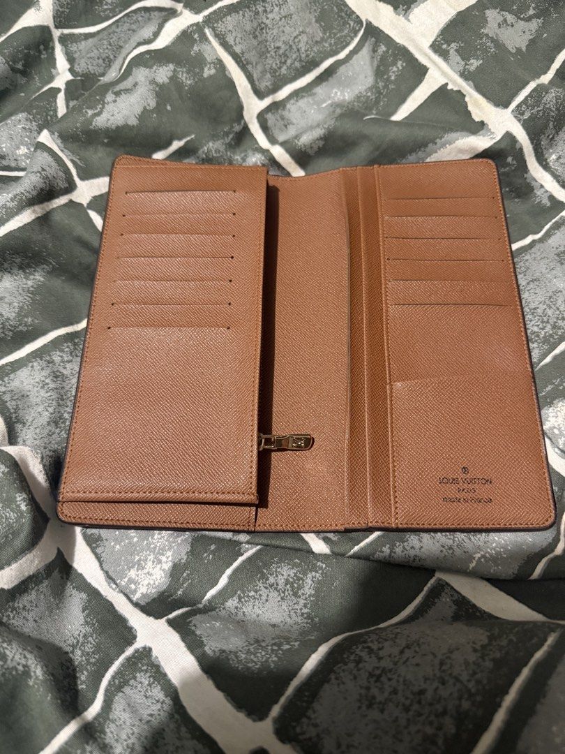 Louis Vuitton Monogram Sarah Long Wallet Brown (Category: Luxury Bags & Wallets) located in Manila. Submitted by safeowl.b6dbb0 (Listing ID 1471023996, Image 3). Description: - Authentic Louis Vuitton long wallet - Iconic monogram canvas with gold-tone hardware - Luxurious brown grained leather interior - Multiple card slots for organization - Secure zipped coin compartment - Stamped Louis Vuitton Paris, Made in France.