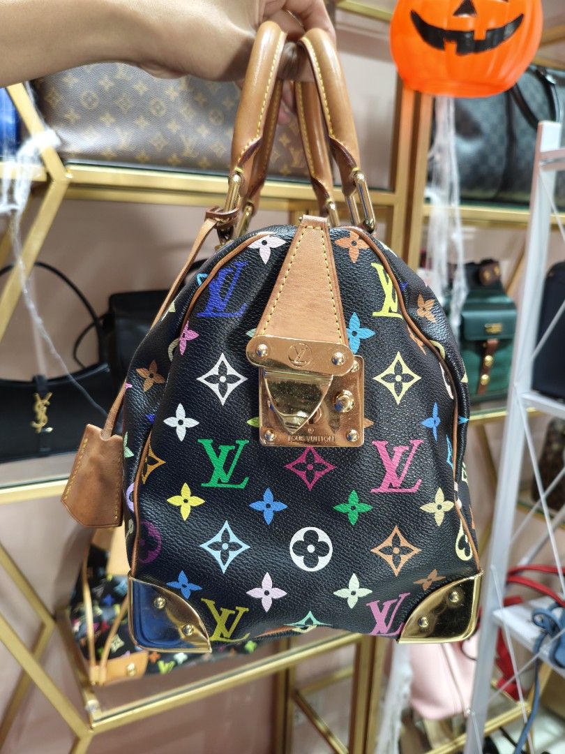 Louis Vuitton Multicolore Monogram Black Speedy Handbag (Category: Luxury Bags & Wallets) located in Quezon City. Submitted by jastine20 (Listing ID 1471100983, Image 1). Description: - Brand: Louis Vuitton - Style: Murakami Multicolore Monogram Canvas (Black) - Hardware: Gold-tone hardware, corner plates, and front pocket clasp - Handles: Rolled leather top handles with signature yellow stitching - Closure: Secure zip top closure - Design: Iconi
