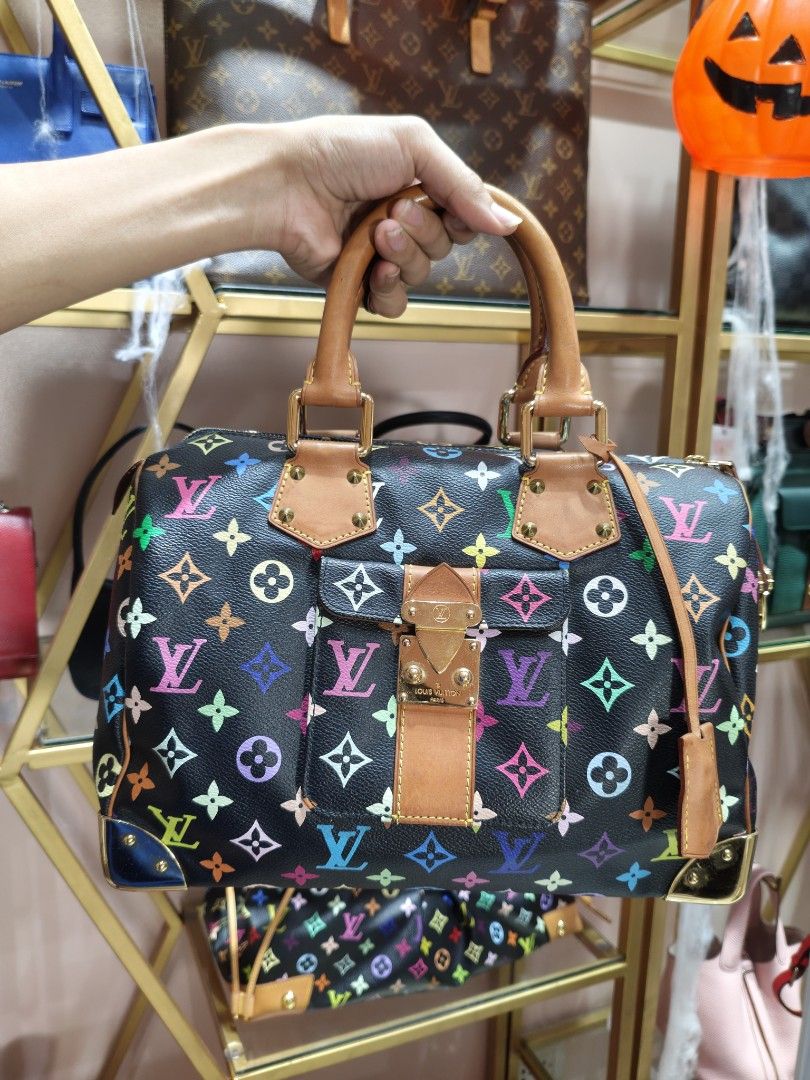 Louis Vuitton Multicolore Monogram Black Speedy Handbag (Category: Luxury Bags & Wallets) located in Quezon City. Submitted by jastine20 (Listing ID 1471100983, Image 3). Description: - Brand: Louis Vuitton - Style: Murakami Multicolore Monogram Canvas (Black) - Hardware: Gold-tone hardware, corner plates, and front pocket clasp - Handles: Rolled leather top handles with signature yellow stitching - Closure: Secure zip top closure - Design: Iconi