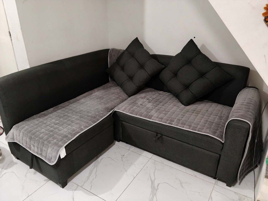 L-Shaped Sofa Bed With Storage (Category: Sofas) located in Rosario. Submitted by mira33396 (Listing ID 1470988383, Image 1). Description: Sofa bed for Sale! -with storage -dark gray -L-Shaped style -may few scratches dahil sa alagang pets pero very maganda pa. -Dimension L x W x H (75” x 60” x 16”) -goods if may visitor kayo sa bahay and need ng extra bed RFS: hindi bagay sa bahay dahil sa alagang pets. No to low ballers Pick-up or lalamove Loca