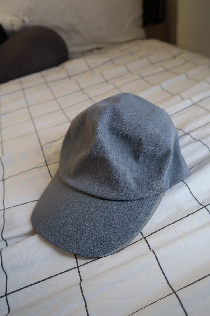 Lululemon Fast and Free Running Hat Cap S/M (Category: Caps & Hats) located in Manila. Submitted by mixi_lexi (Listing ID 1471021260, Image 3). Description: - Authentic Lululemon athletic cap in versatile grey - Textured grid pattern design - Size S/M (56 cm circumference) - Adjustable strap with secure buckle closure - Lightweight fabric with a built-in sweatband for extra comfort - Features a subtle Lululemon logo on the side - Perfect for runn