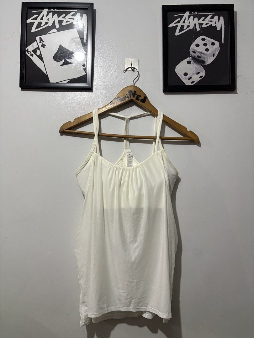 Lululemon Flow Y 2 in 1 Tanktop (Category: Activewear) located in Makati City. Submitted by ThriftedGoods (Listing ID 1471060527, Image 1). Description: Feel free to ask for more detailed photos In excellent condition No issues Length-26 Width-19.