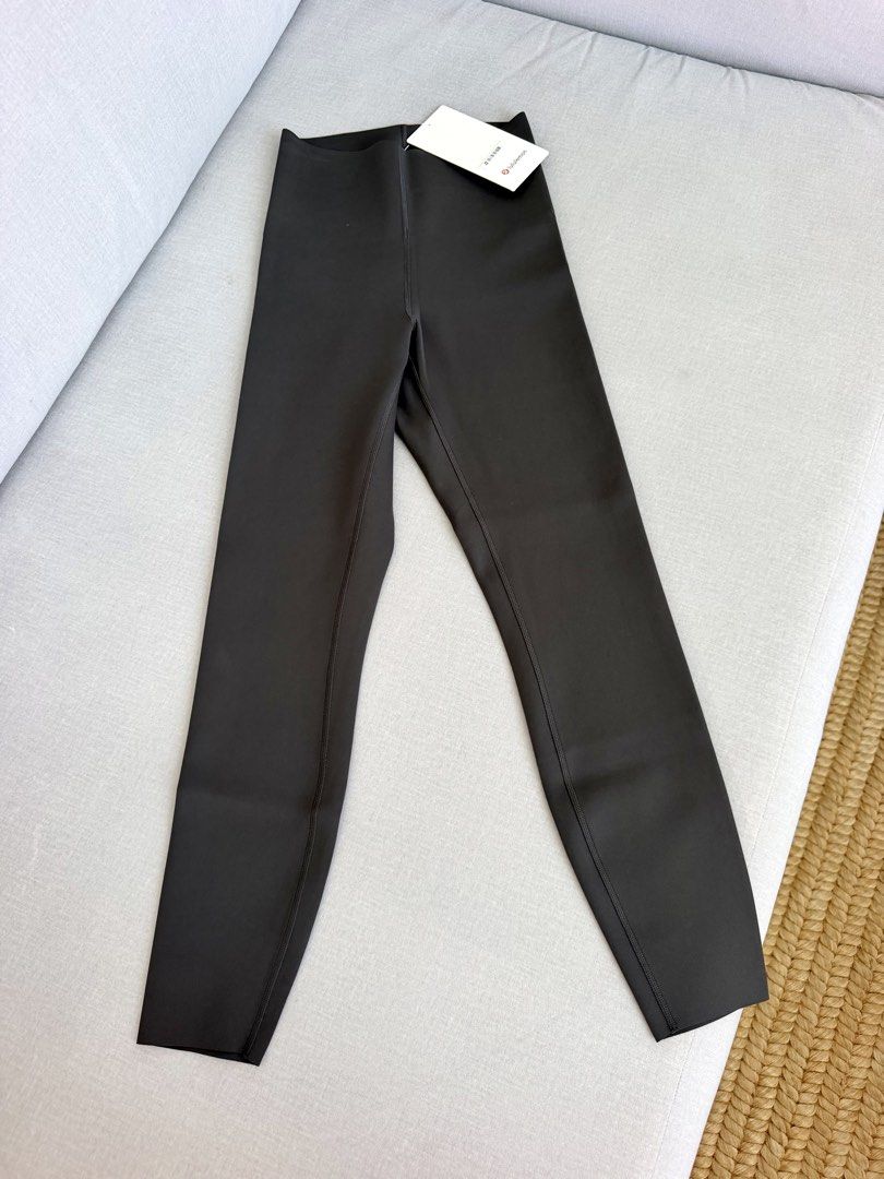 Lululemon Glow Up HR Tight 25" Graphite Grey Size 4 (Category: Activewear) located in Lipa City. Submitted by pauline0303 (Listing ID 1471007239, Image 2). Description: - Brand: Lululemon - Style: Glow Up High Rise Tight 25" - Color: Graphite Grey - Size: AU/US 4 - Condition: Brand new with original hang tag attached - Fabric & Features: Sleek Ultralu fabric, four-way stretch, sweat-wicking - Design: Bonded waistband, minimized seams, and laser-c