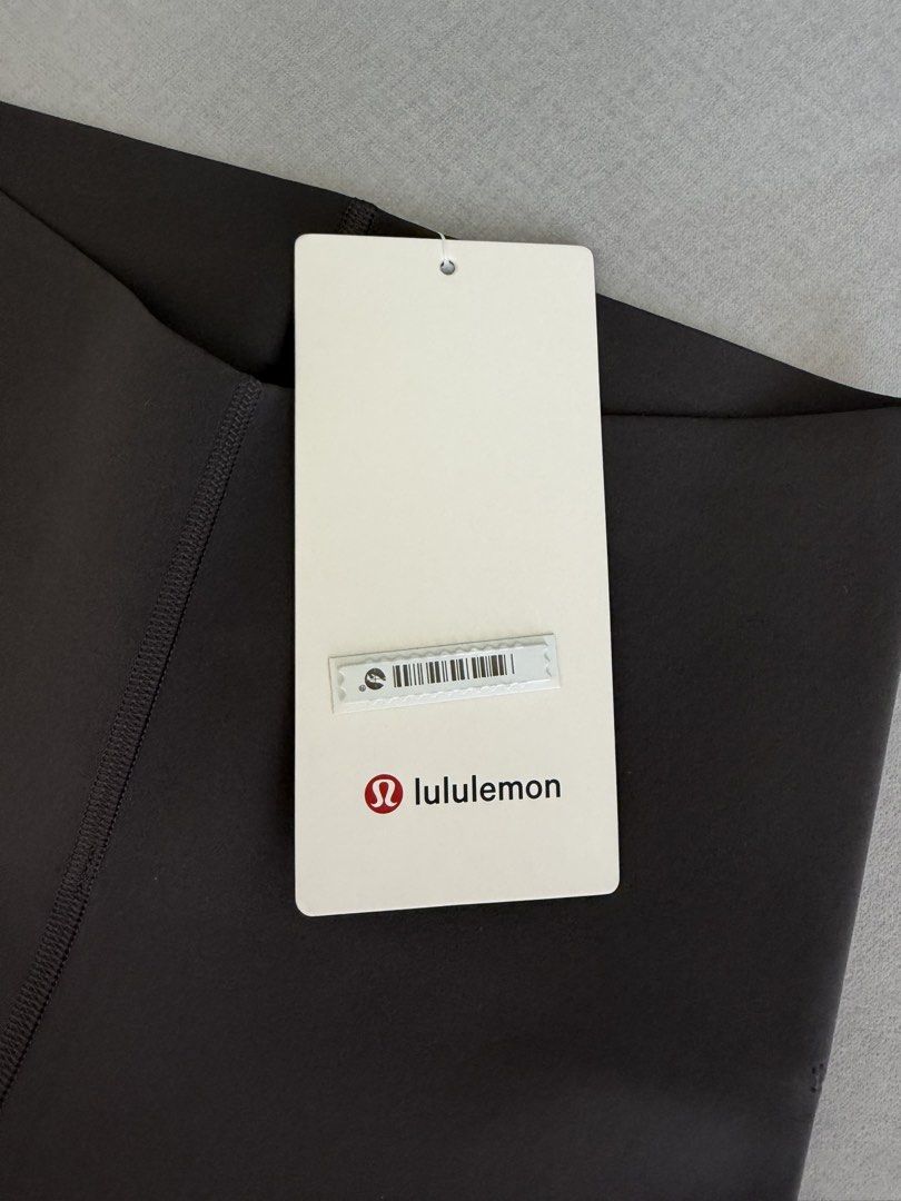 Lululemon Glow Up HR Tight 25" Graphite Grey Size 4 (Category: Activewear) located in Lipa City. Submitted by pauline0303 (Listing ID 1471007239, Image 3). Description: - Brand: Lululemon - Style: Glow Up High Rise Tight 25" - Color: Graphite Grey - Size: AU/US 4 - Condition: Brand new with original hang tag attached - Fabric & Features: Sleek Ultralu fabric, four-way stretch, sweat-wicking - Design: Bonded waistband, minimized seams, and laser-c