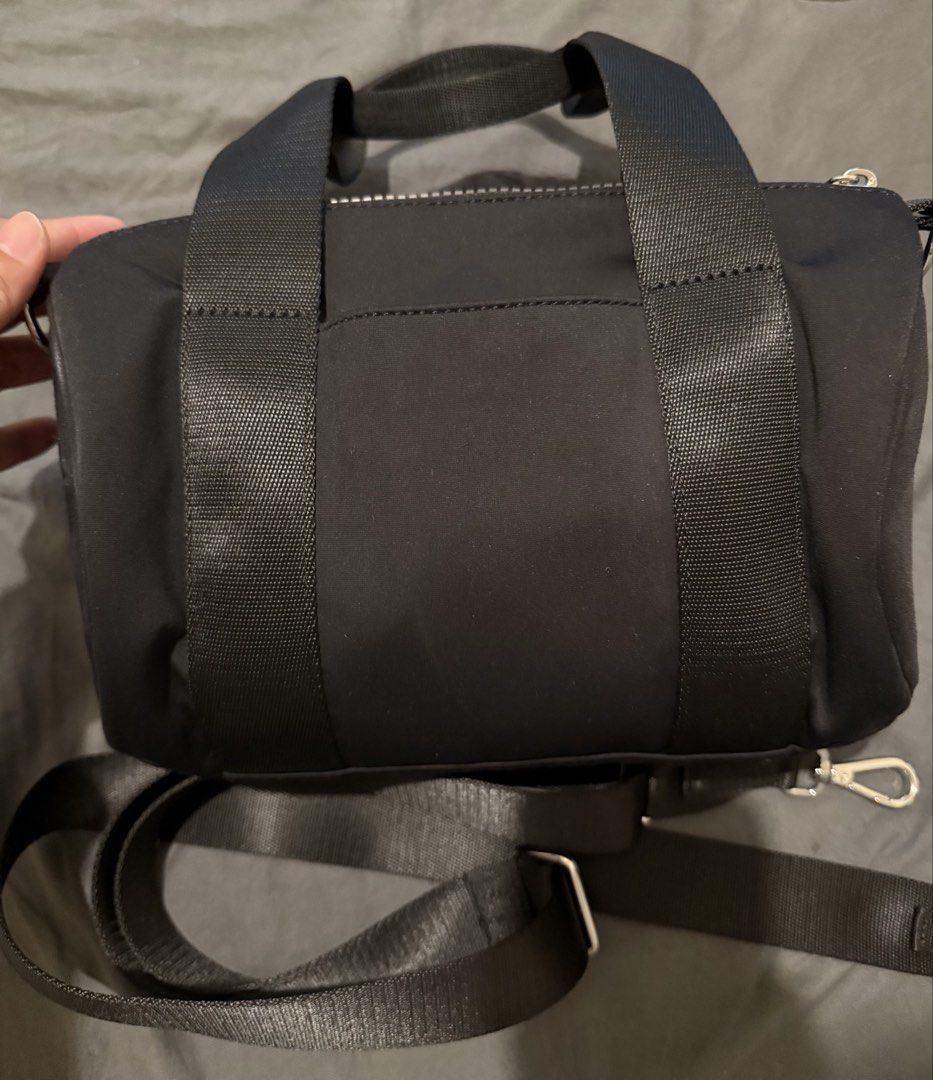 Lululemon knit nylon mini Duffle Bag (Category: Cross-body Bags) located in Marikina City. Submitted by maekristine.abadam (Listing ID 1471021849, Image 3). Description: -Authentic black Lululemon duffle bag 5L - Dual carrying handles and adjustable/removable shoulder strap - zipper top closure with signature metal pull tab - Canada bought - no inclusion.