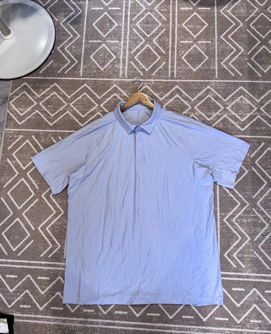 Lululemon Light Blue Polo Shirt (Category: Tshirts & Polo Shirts ) located in Bulacan. Submitted by zyannechlo86360 (Listing ID 1470957813, Image 1). Description: - Brand: Lululemon - Color: Light blue - Style: Athletic polo with short sleeves and classic snap-button collar - Material: Breathable textured fabric for maximum comfort - Details: Signature Lululemon logo printed near the lower hem - Best for: Golf, tennis, or everyday casual wear - C