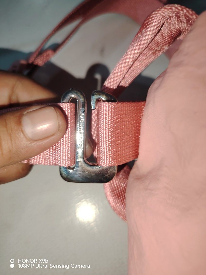 Lululemon Pink Crossbody Bag (Category: Cross-body Bags) located in Manila. Submitted by solenjella65945 (Listing ID 1471113258, Image 3). Description: - Authentic Lululemon shoulder bag in a cute pink shade - Clean condition with no major flaws - Stylish front diagonal zipper pocket - Matching pink strap with adjustable silver hardware buckle - Pink interior lining featuring a mesh slip pocket and Lululemon logo patch.