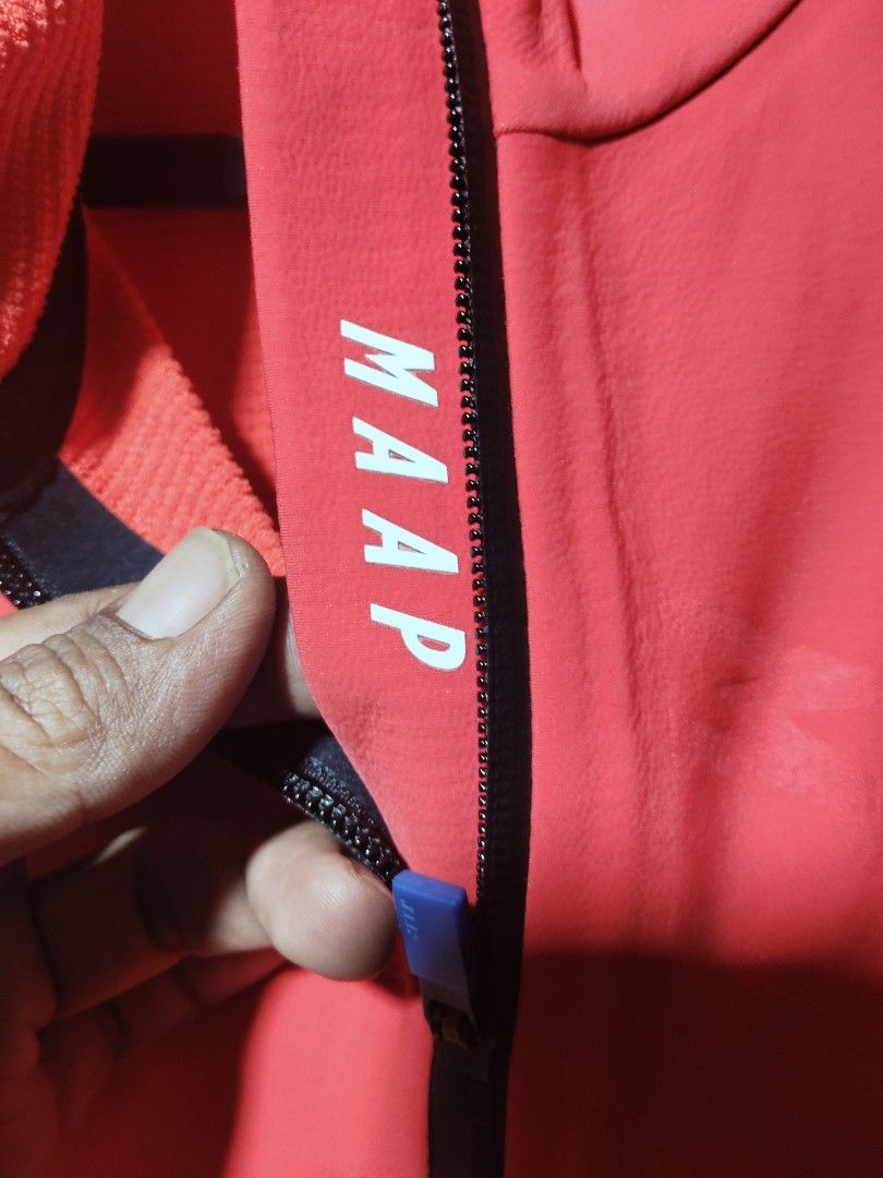 MAAP Red Cycling Jacket Thermal Long Sleeve (Category: Coats, Jackets and Outerwear) located in Mandaue City. Submitted by rodanthon (Listing ID 1471046982, Image 2). Description: - MAAP cycling jacket in bright red - Thermal textured inner lining keeps you warm on cold rides - Full zip closure with stylish blue branded pull tab and reliable YKK hardware - Subtle tonal MAAP logo on chest and sleeve for a sleek look - Elastic hem ensures a secure,