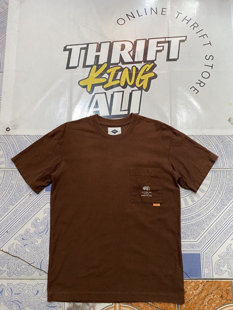 Madness Pocket Tee (Category: Tshirts & Polo Shirts ) located in Rosario. Submitted by thrift_king_ali (Listing ID 1471051311, Image 1). Description: Madness Pocket Tee Medium Dimes: W-19.5 L-27 no issue excellent condition 400+sf .