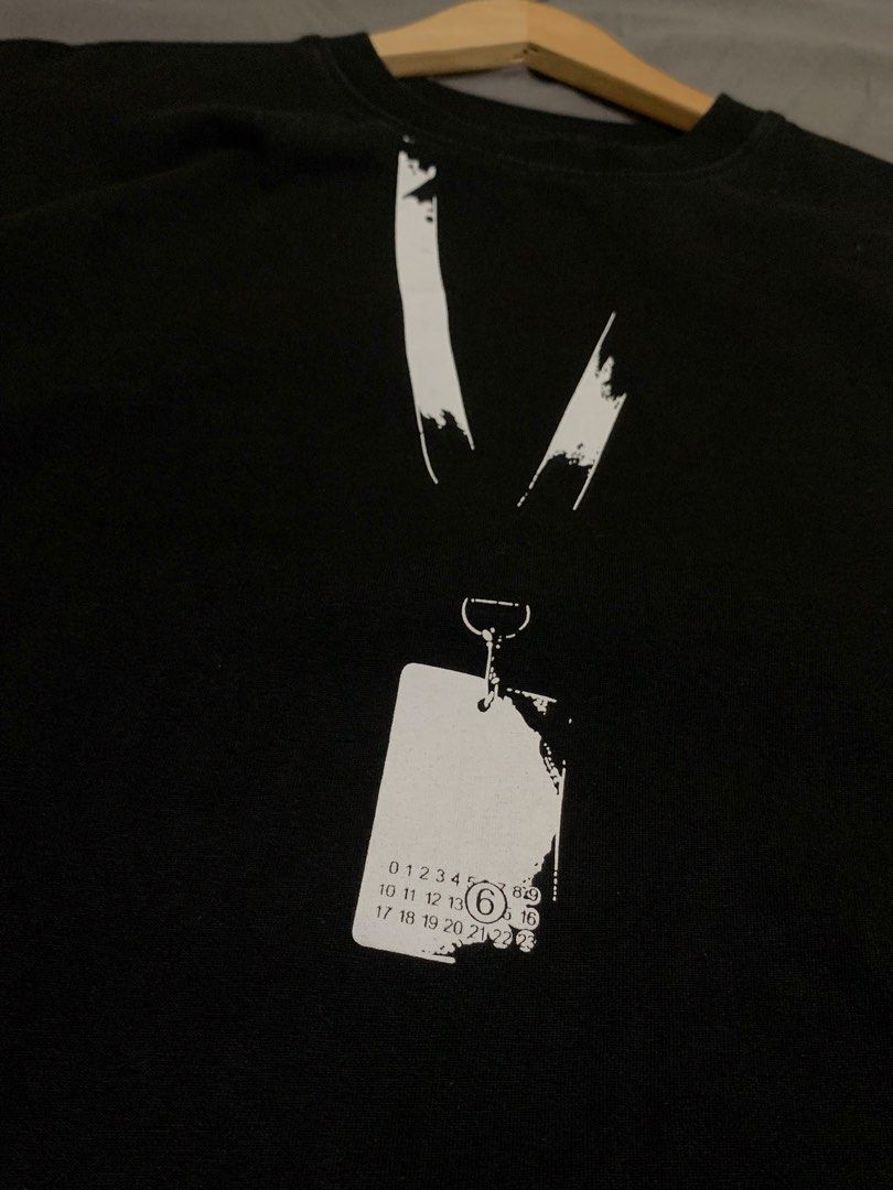 Maison Margiela Black Backstage Pass shirt (Category: Tshirts & Polo Shirts ) located in Roxas City. Submitted by vaultcultureco. (Listing ID 1470982286, Image 3). Description: - Brand: Maison Margiela Paris - Color: Black - Size: 50 (Men's) - Design: Iconic 'Backstage Pass' lanyard and ID badge graphic print with numeric branding on front -Issue: See last 2 pic (not sure if removable) Never the less, d nmn sya mapapansin Color rate: 9.3/10 23.5x