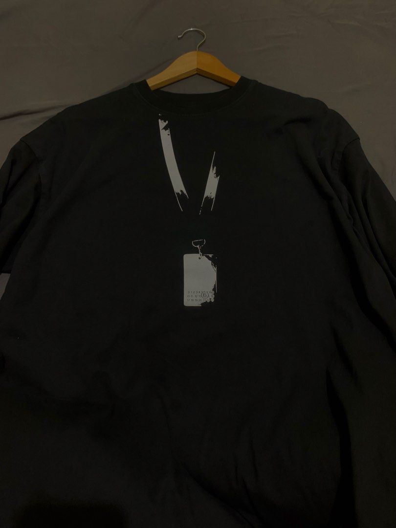 Maison Margiela Black Backstage Pass shirt (Category: Tshirts & Polo Shirts ) located in Roxas City. Submitted by vaultcultureco. (Listing ID 1470982286, Image 1). Description: - Brand: Maison Margiela Paris - Color: Black - Size: 50 (Men's) - Design: Iconic 'Backstage Pass' lanyard and ID badge graphic print with numeric branding on front -Issue: See last 2 pic (not sure if removable) Never the less, d nmn sya mapapansin Color rate: 9.3/10 23.5x