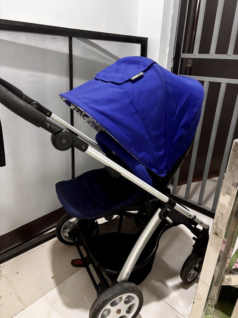 Mamas & Papas Sola 2 Stroller Blue (Category: Strollers) located in Rodriguez. Submitted by anjloving (Listing ID 1471074879, Image 3). Description: - Brand: Mamas & Papas Sola Stroller - Color: Blue with a stylish geometric pattern inside the canopy - Frame: Sturdy silver frame with all-terrain wheels - Seat: Reversible seat unit for parent-facing or world-facing views - Handle: Adjustable handle height for comfortable pushing - Storage: Large u