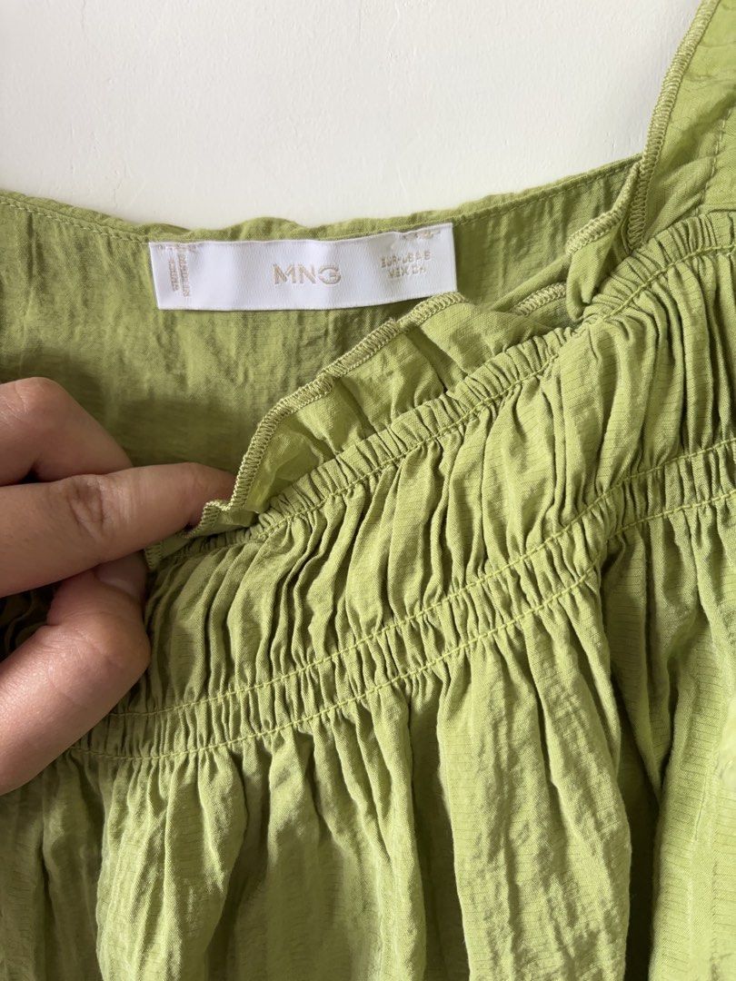 Mango Green Square Neck Ruffle Sleeve Blouse (Category: Blouses) located in Muntinlupa City. Submitted by shopkidsandmom.ph (Listing ID 1471035603, Image 3). Description: Mango green square neck blouse. Short ruffle sleeves, smocked bodice with stretchy elastic texture. Light and flowy material, easy to pull on. Length measures about 20 inches from shoulder to hem. Pit to pit width measures roughly 17 inches across. Great casual top for warm weat