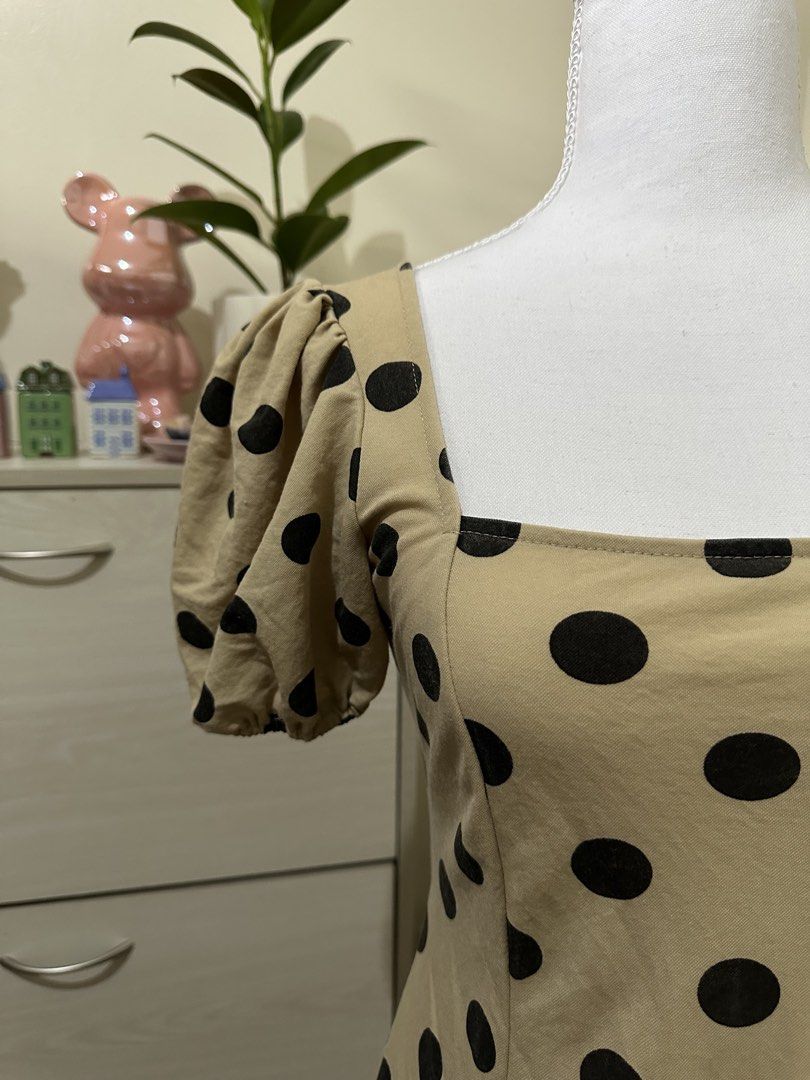 Mango Polka Dot Square Neck Puff Sleeve Dress (Category: Dresses) located in Antipolo. Submitted by wxyz9876 (Listing ID 1471056835, Image 2). Description: - Brand: Mango - Color: Beige with black polka dots - Design: Square neckline & short puff sleeves - Fit: Smocked back panel for extra comfort (EUR 2, fits XS to S) My fave dress :(.
