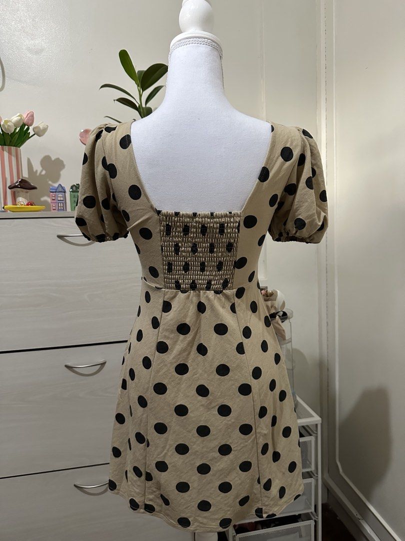 Mango Polka Dot Square Neck Puff Sleeve Dress (Category: Dresses) located in Antipolo. Submitted by wxyz9876 (Listing ID 1471056835, Image 3). Description: - Brand: Mango - Color: Beige with black polka dots - Design: Square neckline & short puff sleeves - Fit: Smocked back panel for extra comfort (EUR 2, fits XS to S) My fave dress :(.