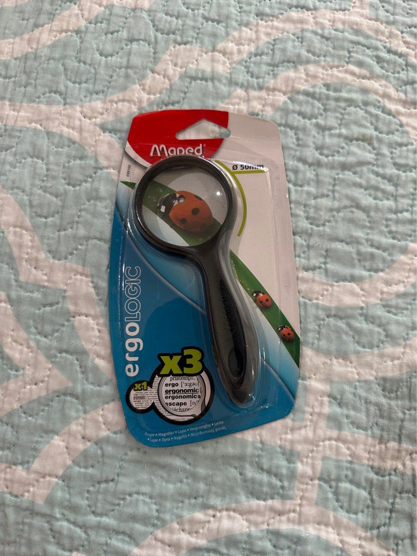Maped Ergologic 50mm 3x Magnifying Glass (Category: Stationery & School Supplies) located in Pasig City. Submitted by nina.declutter (Listing ID 1470966421, Image 1). Description: - Brand: Maped Ergologic - Lens Size: 50mm with 3x magnification - Handle: Soft, ergonomic grip for maximum comfort - Condition: Brand new, unopened in original blister packaging - Source: Purchased directly from SM Supplies - Ideal for reading small text, crafts, hobbi