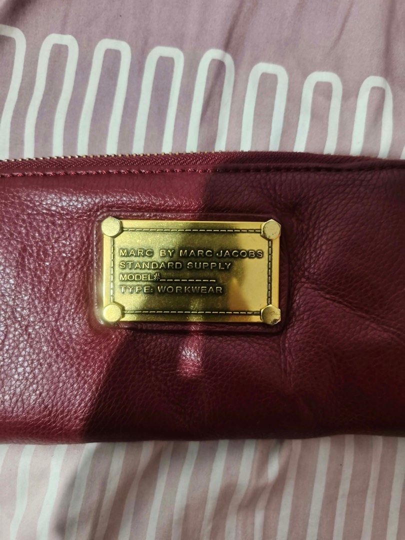 Marc by Marc Jacobs Long Wallet (Category: Luxury Bags & Wallets) located in Alaminos. Submitted by thriftings625 (Listing ID 1471069531, Image 3). Description: No issue Good as new Color rate: 9/10 No scratch, no color transfer.