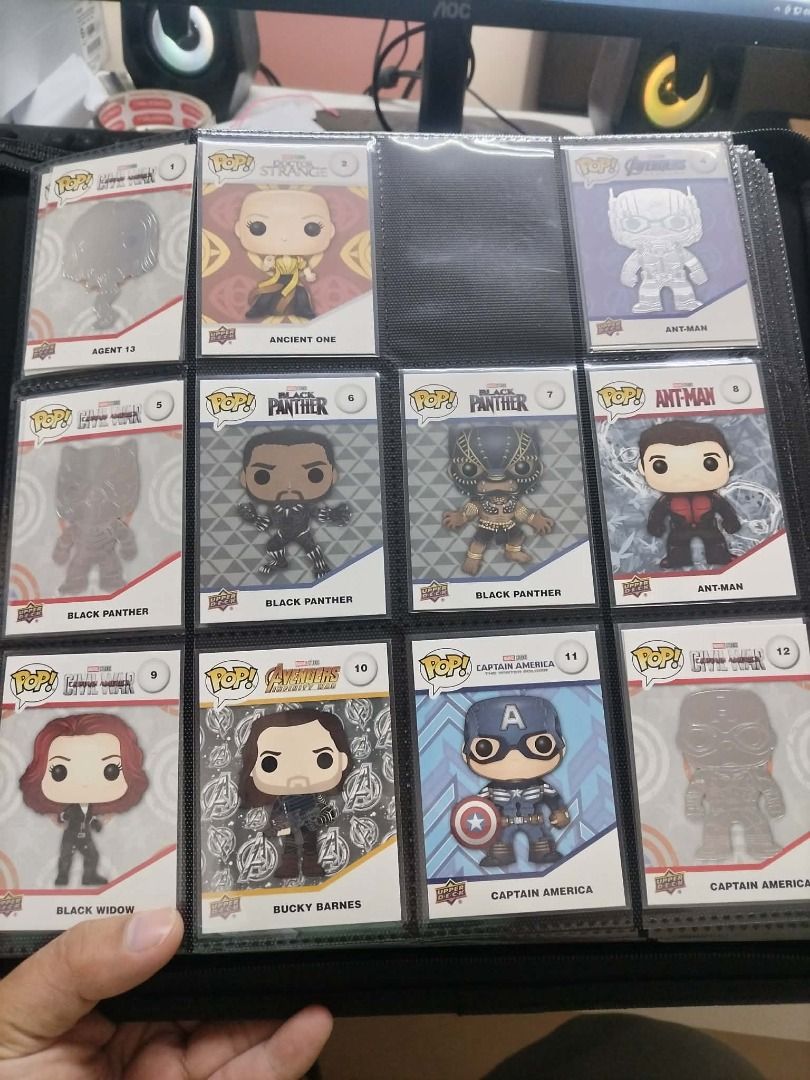 Marvel Funko Pop Upper Deck Trading Cards Binder Set (Category: Western Merchandise) located in Cebu City. Submitted by quincemer2016 (Listing ID 1470936661, Image 1). Description: - Complete set of 12 Upper Deck Marvel Funko Pop cards (Numbered 1-12) - Features iconic characters: Ancient One, Black Panther, Ant-Man, Black Widow, Bucky Barnes, and Captain America - Kept safe in individual protective plastic sleeves inside a card binder - Great ad