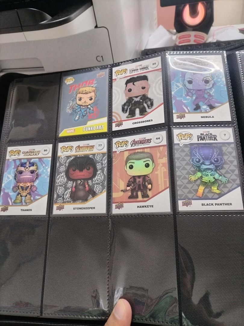 Marvel Funko Pop Upper Deck Trading Cards Binder Set (Category: Western Merchandise) located in Cebu City. Submitted by quincemer2016 (Listing ID 1470936661, Image 3). Description: - Complete set of 12 Upper Deck Marvel Funko Pop cards (Numbered 1-12) - Features iconic characters: Ancient One, Black Panther, Ant-Man, Black Widow, Bucky Barnes, and Captain America - Kept safe in individual protective plastic sleeves inside a card binder - Great ad