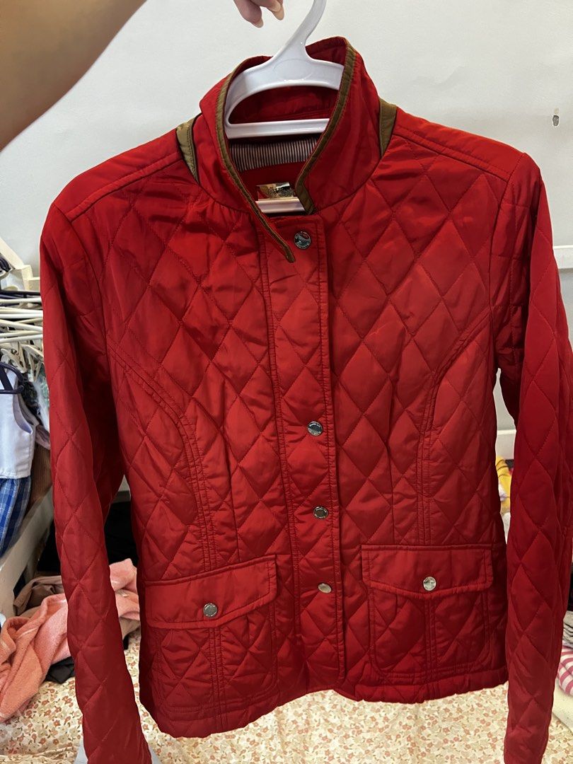 Massimo Dutti Red Quilted Jacket Size L (Category: Coats, Jackets and Outerwear) located in Calamba. Submitted by noreenmend83749 (Listing ID 1470962220, Image 1). Description: - Brand: Massimo Dutti - Color: Bright Red with Brown Trim - Size: EUR L / USA L / MEX 34 - Details: Gold brand lettering on the back, front snap buttons, lower patch pockets with snap closures - Lining: Stylish striped inner lining - Origin: Made in Vietnam Preloved :) no