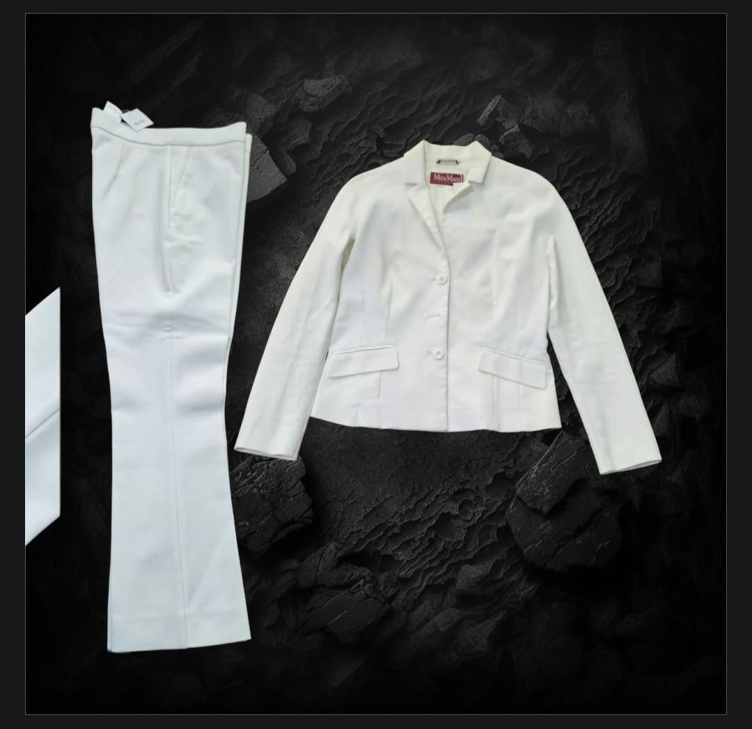 MaxMara White Pantsuit Blazer Set (Category: Sets or Coordinates) located in Paranaque City. Submitted by calm_youngstore7 (Listing ID 1471057199, Image 2). Description: 80% OFF RETAIL! - Brand: MaxMara - Item: Women's Pantsuit (Blazer and Trousers) - Color: White - Blazer Details: Three-button closure, front flap pockets, chest 18" across, length 22.5" - Trouser Details: Waist measures 15" - Style: Classic tailoring, clean and professional look 