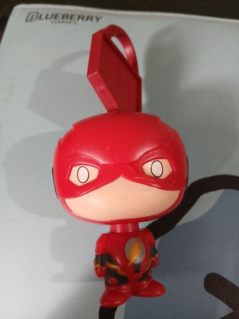 McDonalds DC The Flash Chibi Figurine Toy Keychain (Category: Character Goods) located in Manila. Submitted by diczenestr94951 (Listing ID 1470940479, Image 2). Description: - Official McDonald's promotional The Flash chibi toy - Features cute red suit, mask, and yellow lightning emblem - Attached red McDonald's branded plastic tag with golden arches logo - Compact size, great for clipping onto bags or backpacks - Perfect addition for DC Comics a