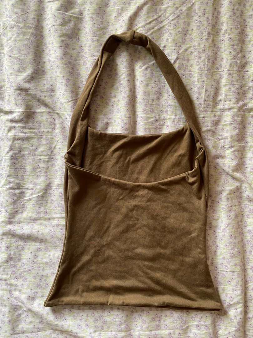 MERA Brown Halter Top Size XS (Category: Sleeveless) located in Quezon City. Submitted by damclothings.ph (Listing ID 1470950329, Image 2). Description: - Brand: MERA - Item: Halter Top - Color: Rich Brown - Size: XS - Material: Soft stretch fabric - Condition: Worn a couple of times, solid shape - Origin: Made in the Philippines.