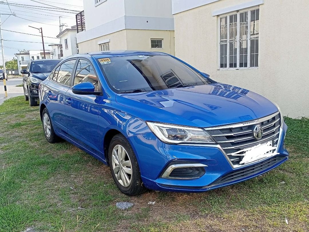 MG 5 (Category: Used Cars) located in Quezon City. Submitted by mhinsunshine11377 (Listing ID 1471119030, Image 1). Description: FOR SALE: 2021 MG5 MT CORE Asking Price: ₱450,000 - (Negotiable) UNIT DETAILS Year Model: 2021 Variant: MG5 MT Core Transmission: Manual Mileage: 21,000+ km Condition: Good overall condition, with a few minor scratches Price: ₱450,000 Modern and sporty design Spacious interior and trunk Comfortable for daily driving and