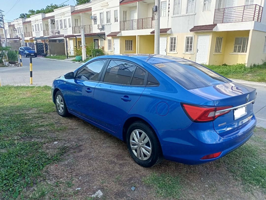 MG 5 (Category: Used Cars) located in Quezon City. Submitted by mhinsunshine11377 (Listing ID 1471119030, Image 3). Description: FOR SALE: 2021 MG5 MT CORE Asking Price: ₱450,000 - (Negotiable) UNIT DETAILS Year Model: 2021 Variant: MG5 MT Core Transmission: Manual Mileage: 21,000+ km Condition: Good overall condition, with a few minor scratches Price: ₱450,000 Modern and sporty design Spacious interior and trunk Comfortable for daily driving and
